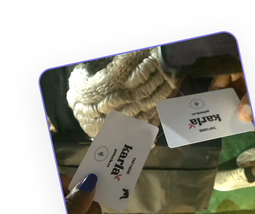 Student showing off the Karla card